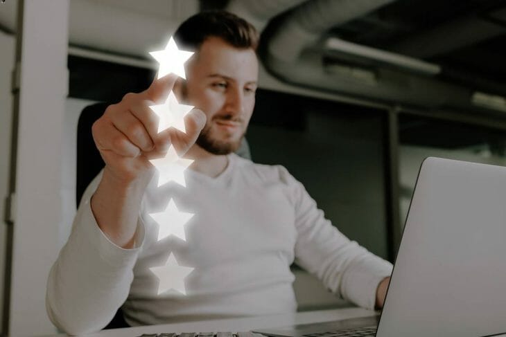 5-star Expertise - A man putting a 5-star review