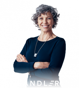 A woman smiles with her arms folded for Sandler's lifestyle image